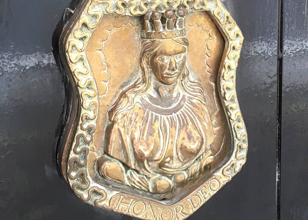 A golden plaque of the Mercers Maiden